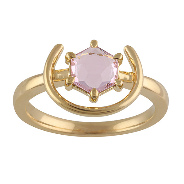 a detail image of our gemstone ring in gold with pink spinel in a rose cut hexagonal shape. The spinel is prong set with a half halo of gold around it. Size inclusive, plus size ring.